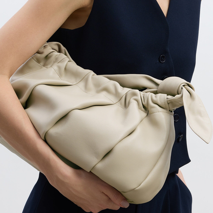 Calm Oat Neutral Gathered Pleat Crescent Shoulder Bag With Leaf Knotted Strap Detail And Hidden Magnetic Fastening