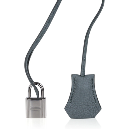 Muted Sage Grey-Green Pebble Grain Large Trapezoid Hand Tote With Cool Polished Silvery Twist Lock Hardware And Matching Textured Suspended Metal Padlock Charm